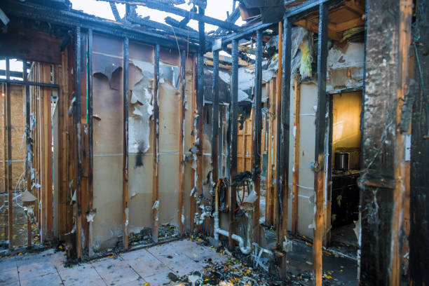 Professional Fire Damage Restoration technician working in Chouteau, OK